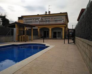 Swimming pool of Single-family semi-detached for sale in Santa Coloma de Farners