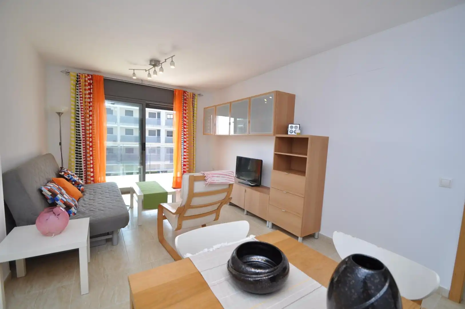 Sala de estar de Apartamento en venta en La Ràpita con Amueblado y Piscina comunitaria