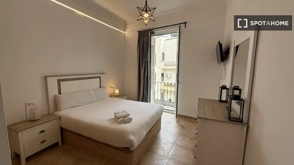 Dormitori de Apartament per a compartir en Málaga amb Aire condicionat, Terrassa i Moblat