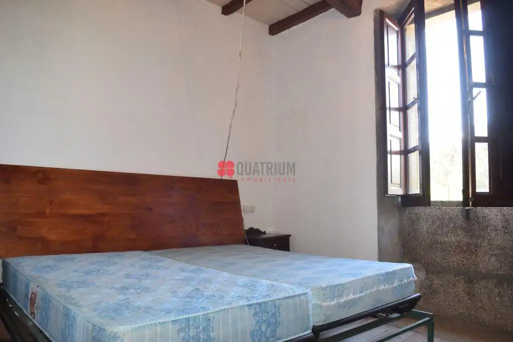 Dormitori de Casa o xalet en venda en Santiago de Compostela  amb Jardí privat