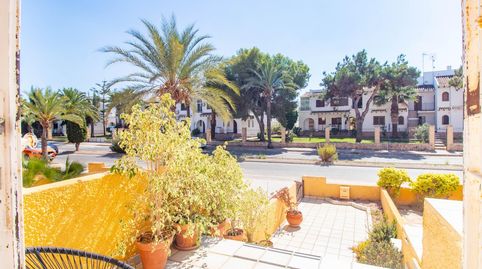 Foto 3 de Casa adosada en venta en Calle Poniente, Cabo Roig, Orihuela