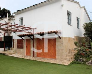 Vista exterior de Casa adosada en venda en Santa Cristina d'Aro amb Calefacció, Jardí privat i Terrassa