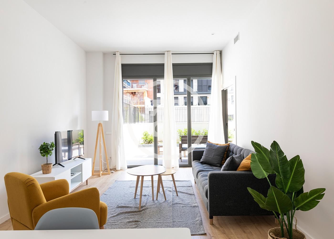 Sala de estar de Piso de alquiler en  Barcelona Capital con Aire acondicionado, Calefacción y Amueblado