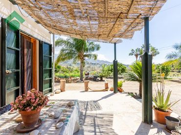 Casa rústica amb jardí en venda a Frigiliana