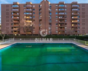 Swimming pool of Duplex for sale in  Madrid Capital  with Terrace, Storage room and Swimming Pool