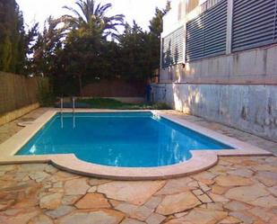 Swimming pool of Duplex for sale in Calafell  with Air Conditioner, Terrace and Storage room