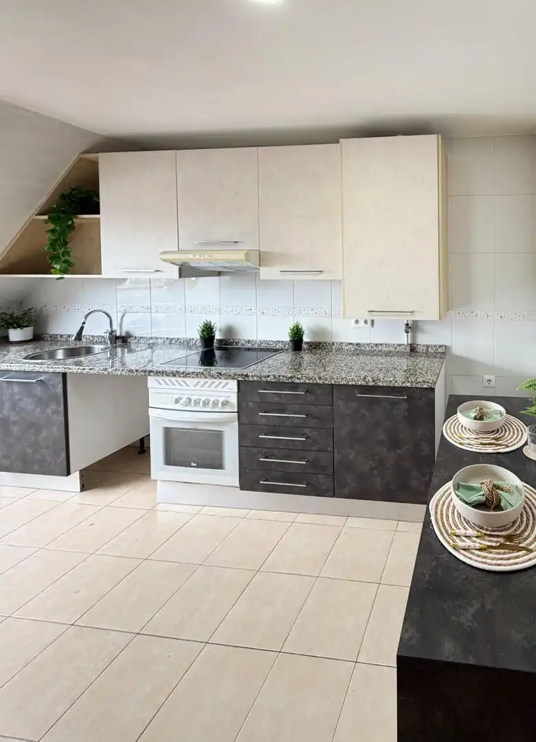 Kitchen of Attic for sale in Oviedo   with Heating, Parquet flooring and Storage room