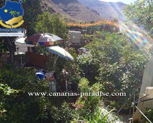 Garden of Single-family semi-detached for sale in Mogán  with Air Conditioner