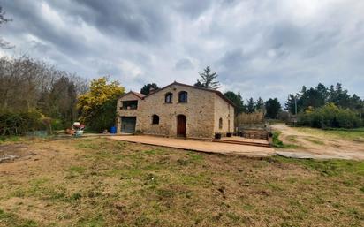 Vista exterior de Finca rústica en venda en Breda amb Jardí privat i Traster