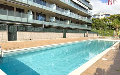 Swimming pool of Flat for sale in Salou  with Air Conditioner, Heating and Private garden