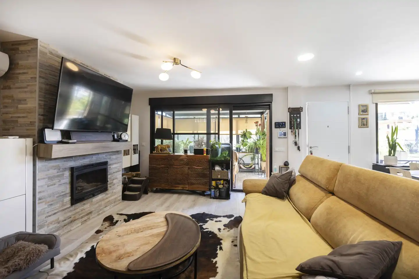 Sala de estar de Casa adosada en venta en L'Eliana con Aire acondicionado y Jardín privado