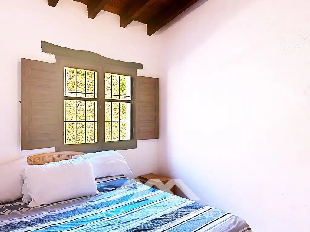 Dormitori de Casa o xalet de lloguer en Almáchar amb Aire condicionat, Terrassa i Rentadora
