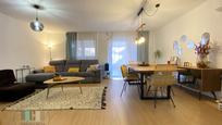 Sala d'estar de Casa adosada en venda en Castellón de la Plana / Castelló de la Plana amb Aire condicionat, Jardí privat i Piscina comunitària