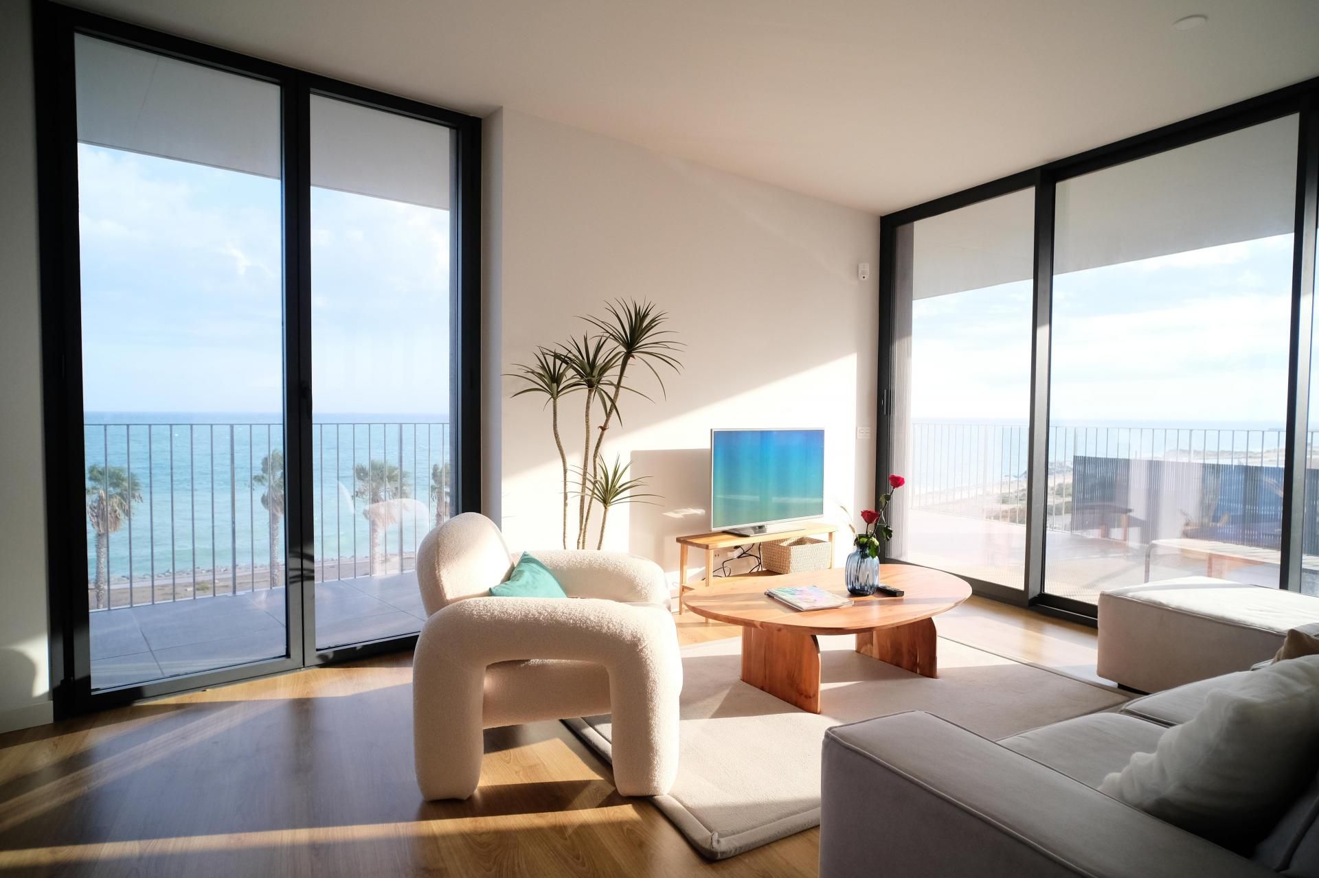 Sala d'estar de Apartament de lloguer en Badalona amb Calefacció, Jardí privat i Piscina