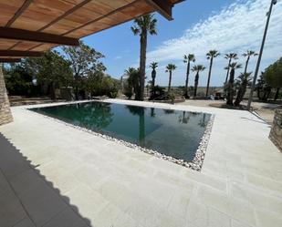 Swimming pool of House or chalet for sale in L'Ampolla  with Air Conditioner and Swimming Pool