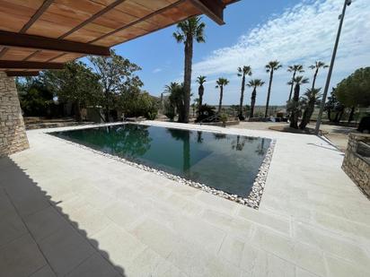 Swimming pool of House or chalet for sale in L'Ampolla  with Air Conditioner and Swimming Pool