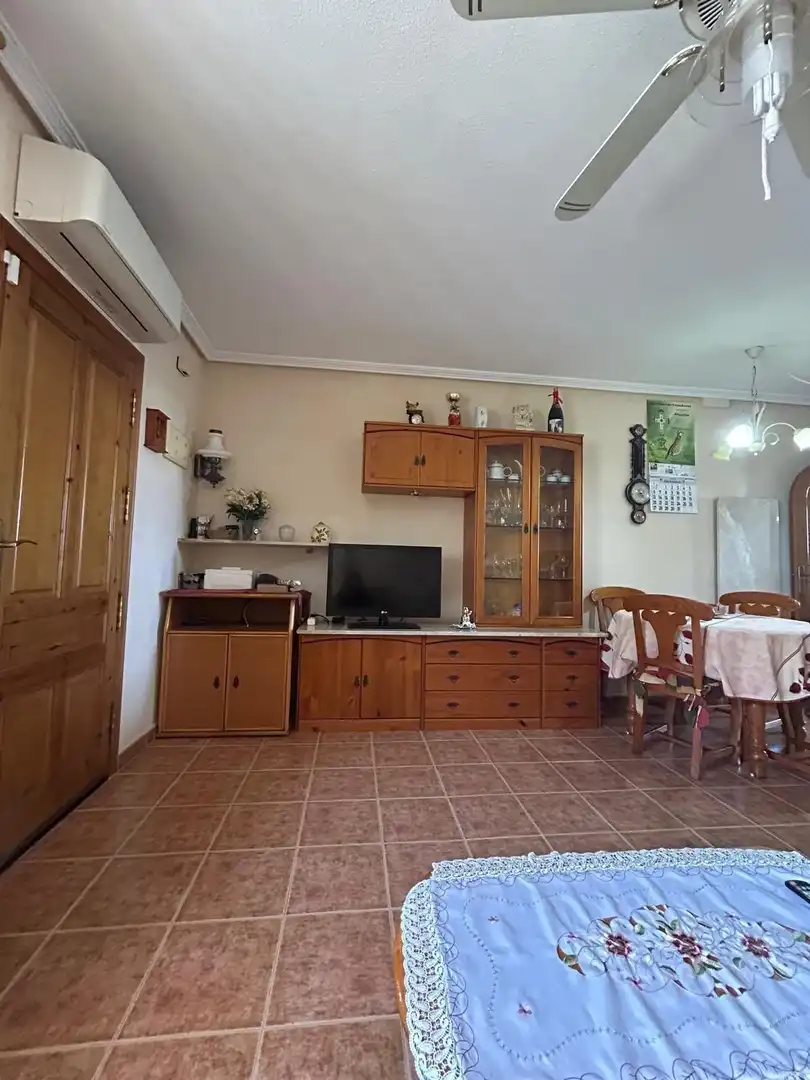 Sala d'estar de Dúplex en venda en Torrevieja amb Aire condicionat, Terrassa i Piscina comunitària