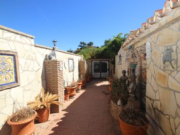 Casa aparellada en venda a Elviria - Cabopino