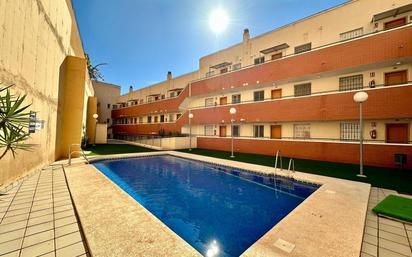 Swimming pool of Flat for sale in Roquetas de Mar  with Air Conditioner, Heating and Terrace