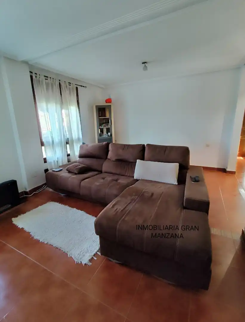 Sala de estar de Casa adosada en venta en Las Quintanillas con Calefacción, Jardín privado y Parquet
