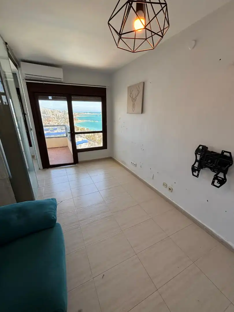Sala de estar de Dúplex en venta en Benalmádena con Aire acondicionado, Terraza y Piscina comunitaria