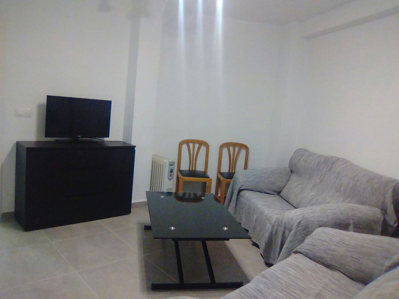 Living room of Flat to share in  Granada Capital  with Air Conditioner, Heating and Furnished