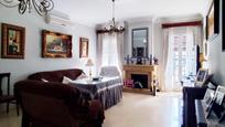 Living room of Single-family semi-detached for sale in Pilas  with Air Conditioner, Terrace and Balcony