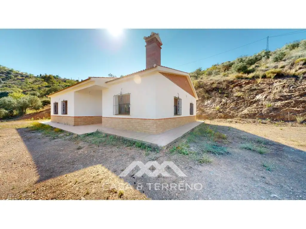 Vista exterior de Casa o xalet en venda en Colmenar amb Aire condicionat