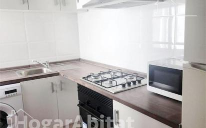 Kitchen of Flat for sale in Torrent  with Air Conditioner