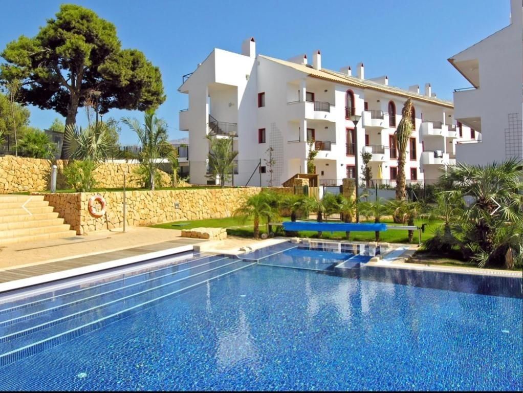 Piscina de Apartament en venda en L'Alfàs del Pi amb Aire condicionat, Calefacció i Jardí privat