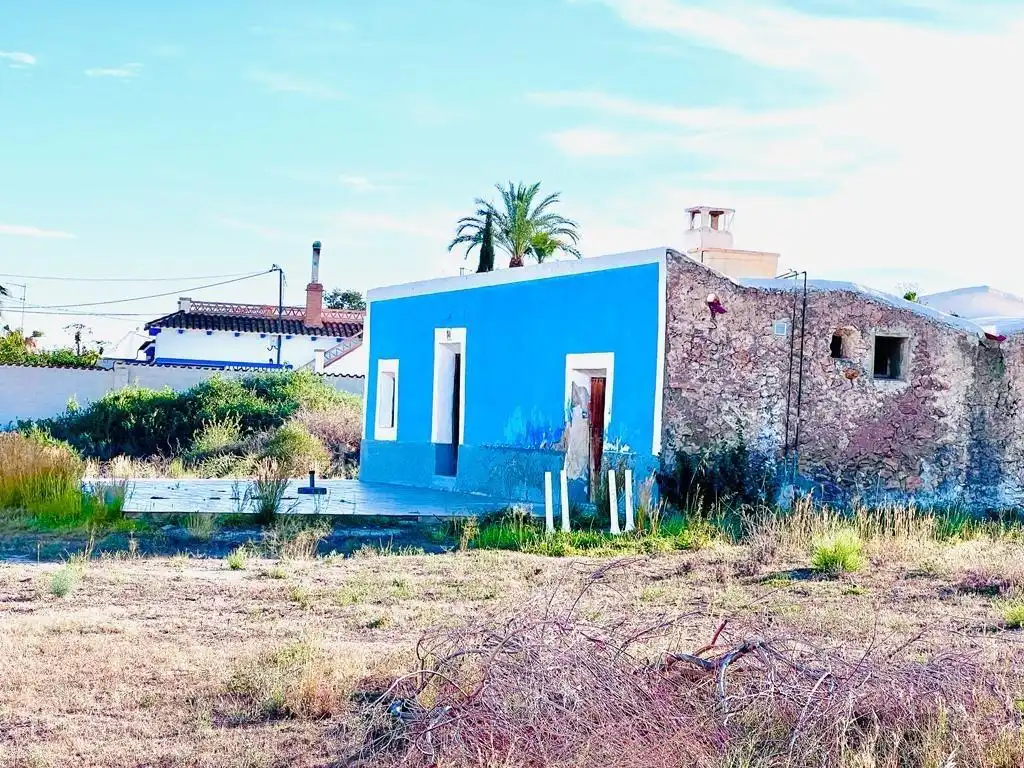 Casa rústica amb jardí en venda a San Juan de los Terreros