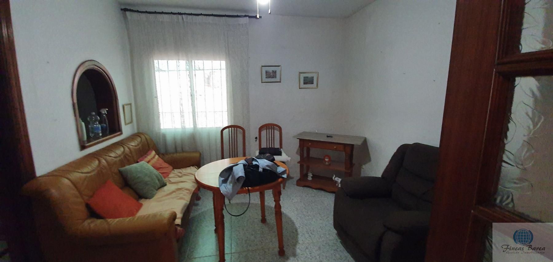 Sala d'estar de Casa adosada en venda en Fuengirola amb Terrassa i Traster