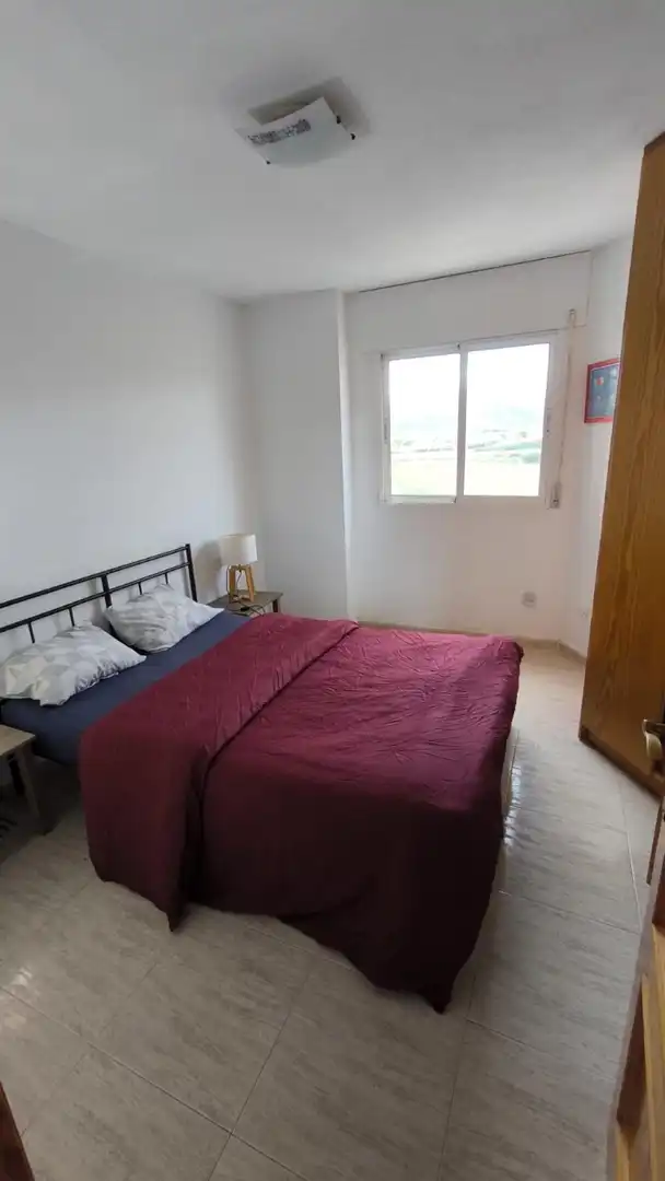 Dormitori de Apartament de lloguer en Cartagena amb Aire condicionat, Piscina i Moblat