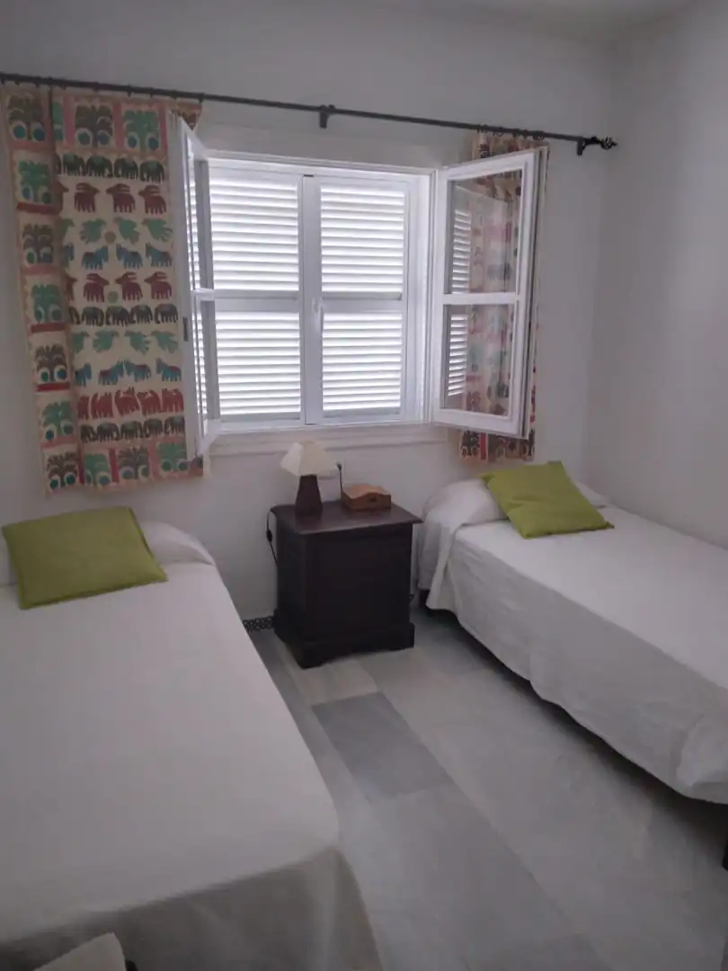 Habitación de Casa adosada en venta en Chiclana de la Frontera con Jardín privado y Piscina comunitaria