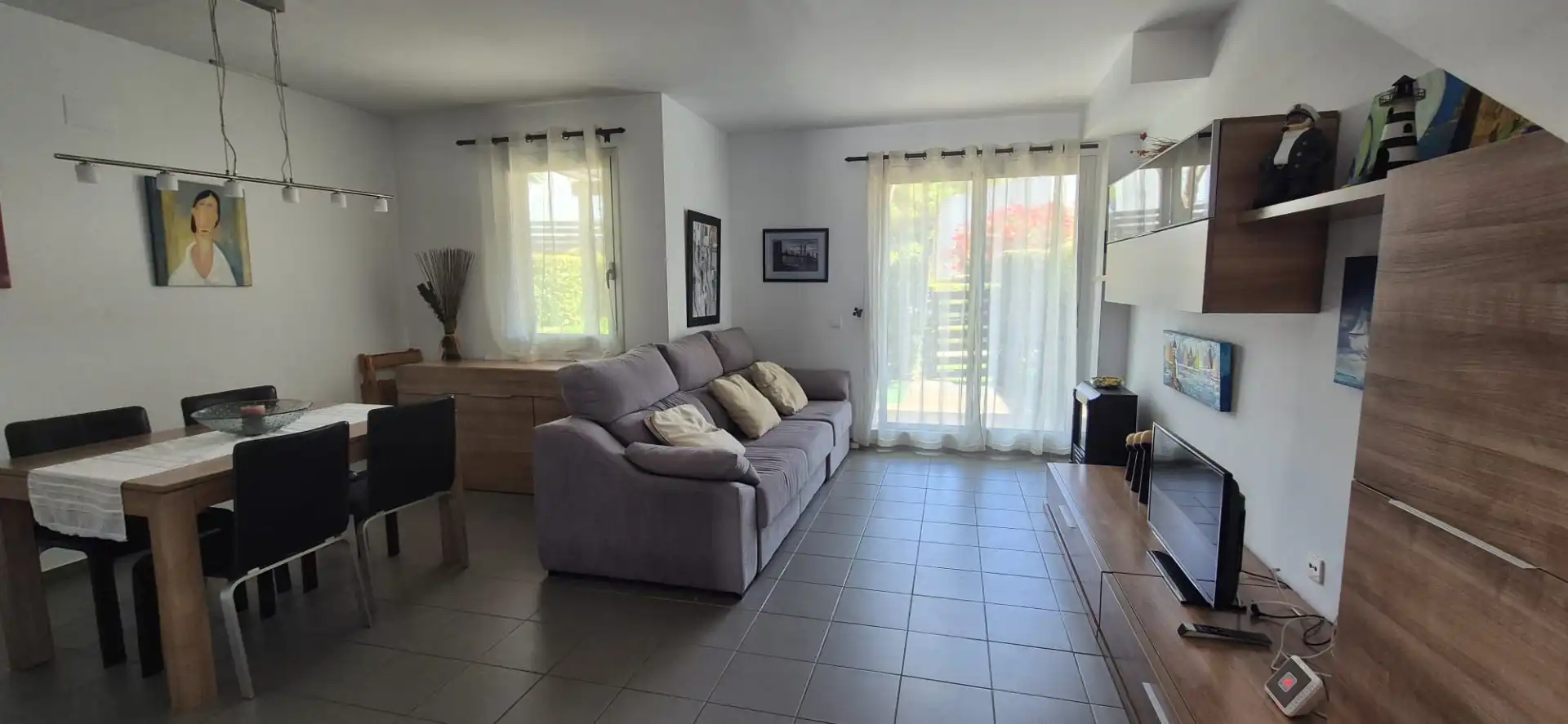 Wohnzimmer von Einfamilien-Reihenhaus zum Verkauf in Mont-roig del Camp mit Klimaanlage, Privatgarten und Terrasse