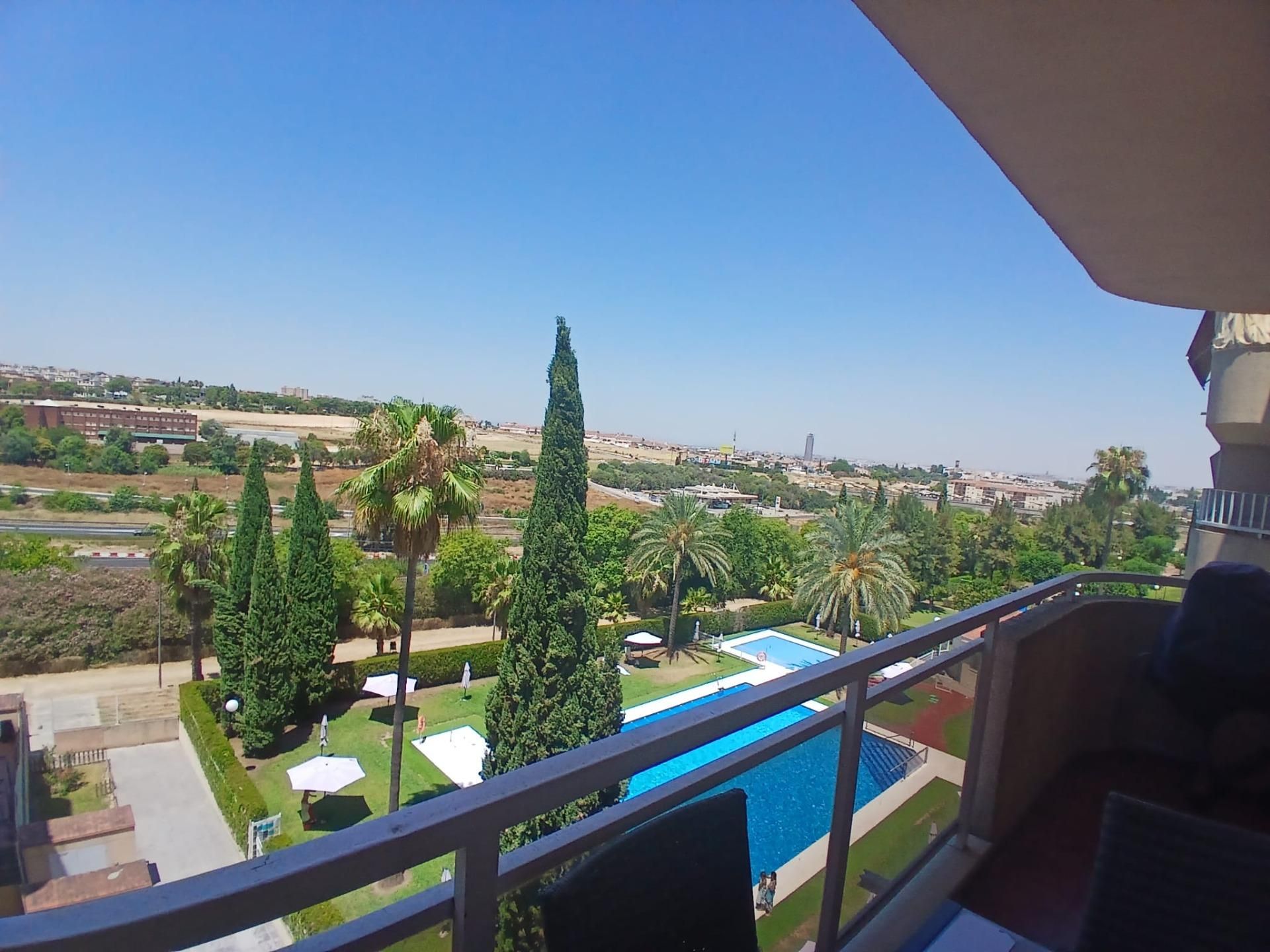 Swimming pool of Flat for sale in San Juan de Aznalfarache  with Air Conditioner, Heating and Terrace