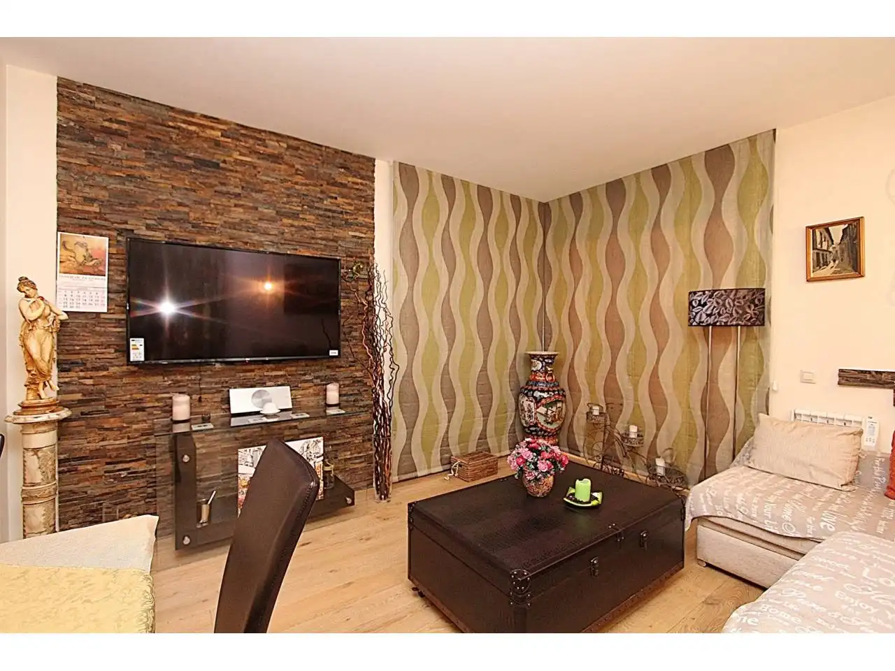 Wohnzimmer von Wohnung zum Verkauf in Lloret de Mar mit Klimaanlage, Heizung und Privatgarten