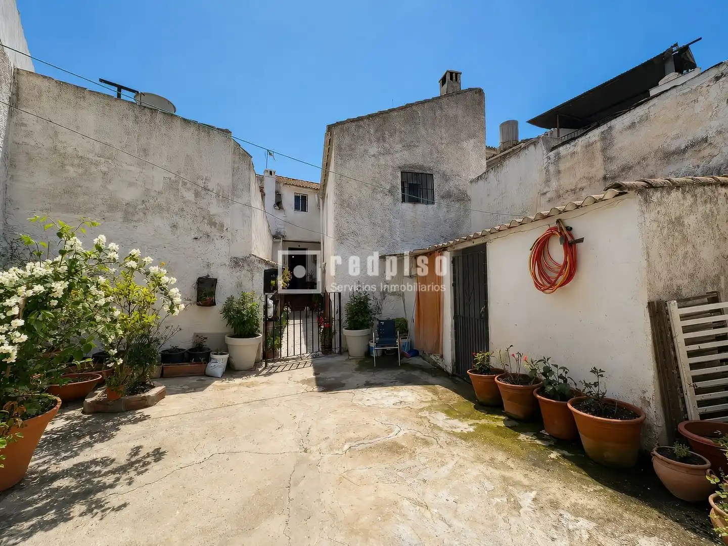 Vista exterior de Casa o xalet en venda en Colmenar amb Calefacció, Jardí privat i Terrassa