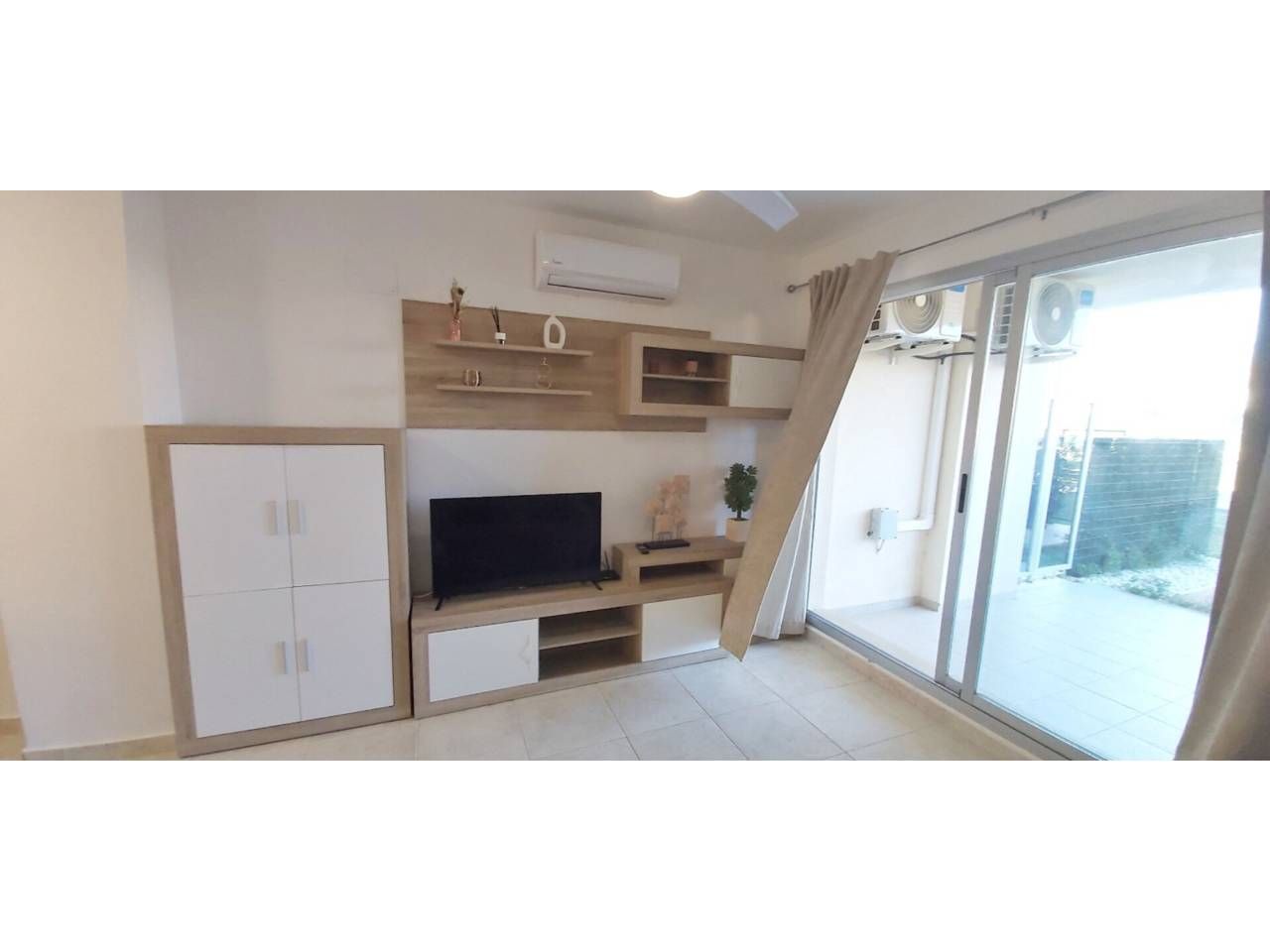 Sala de estar de Piso de alquiler en San Jorge / Sant Jordi con Aire acondicionado, Terraza y Amueblado