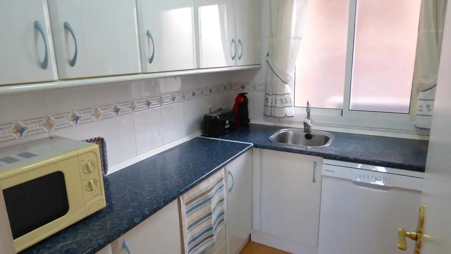 Kitchen of Flat for sale in Benidorm  with Air Conditioner, Furnished and Community pool