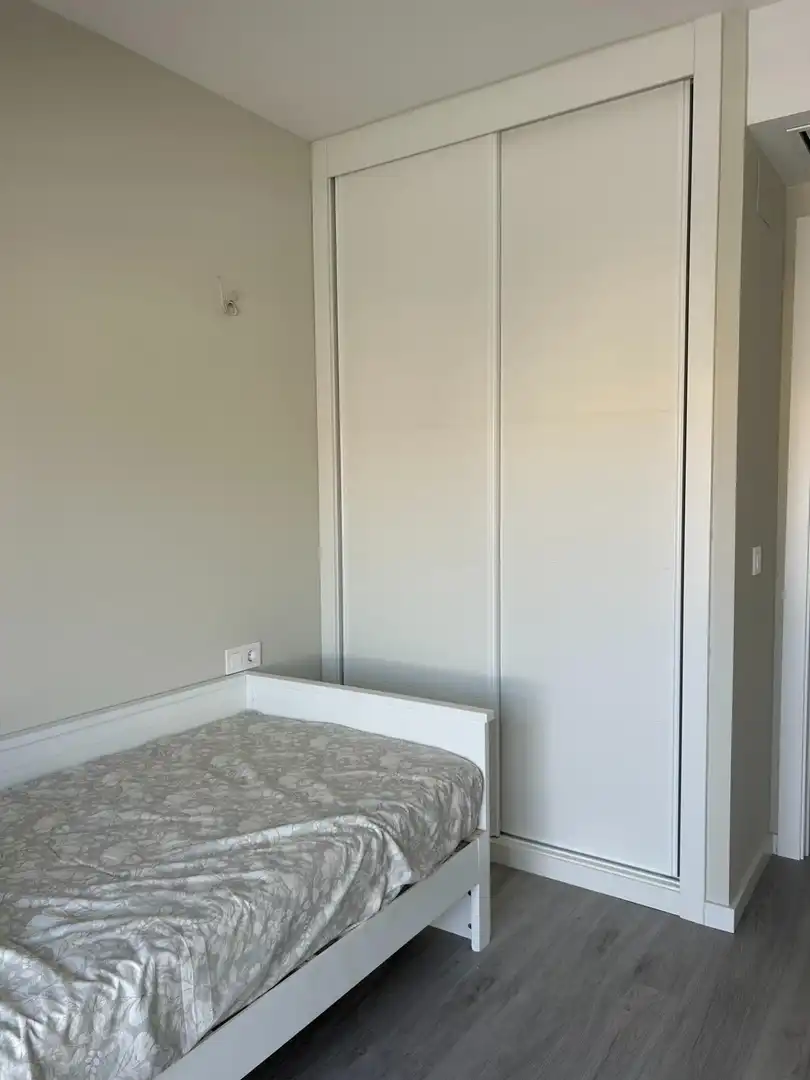 Habitación de Apartamento de alquiler en Dénia con Aire acondicionado, Jardín privado y Terraza