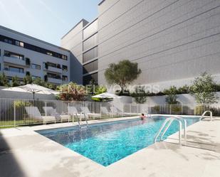 Swimming pool of Apartment for sale in  Madrid Capital  with Air Conditioner, Heating and Terrace