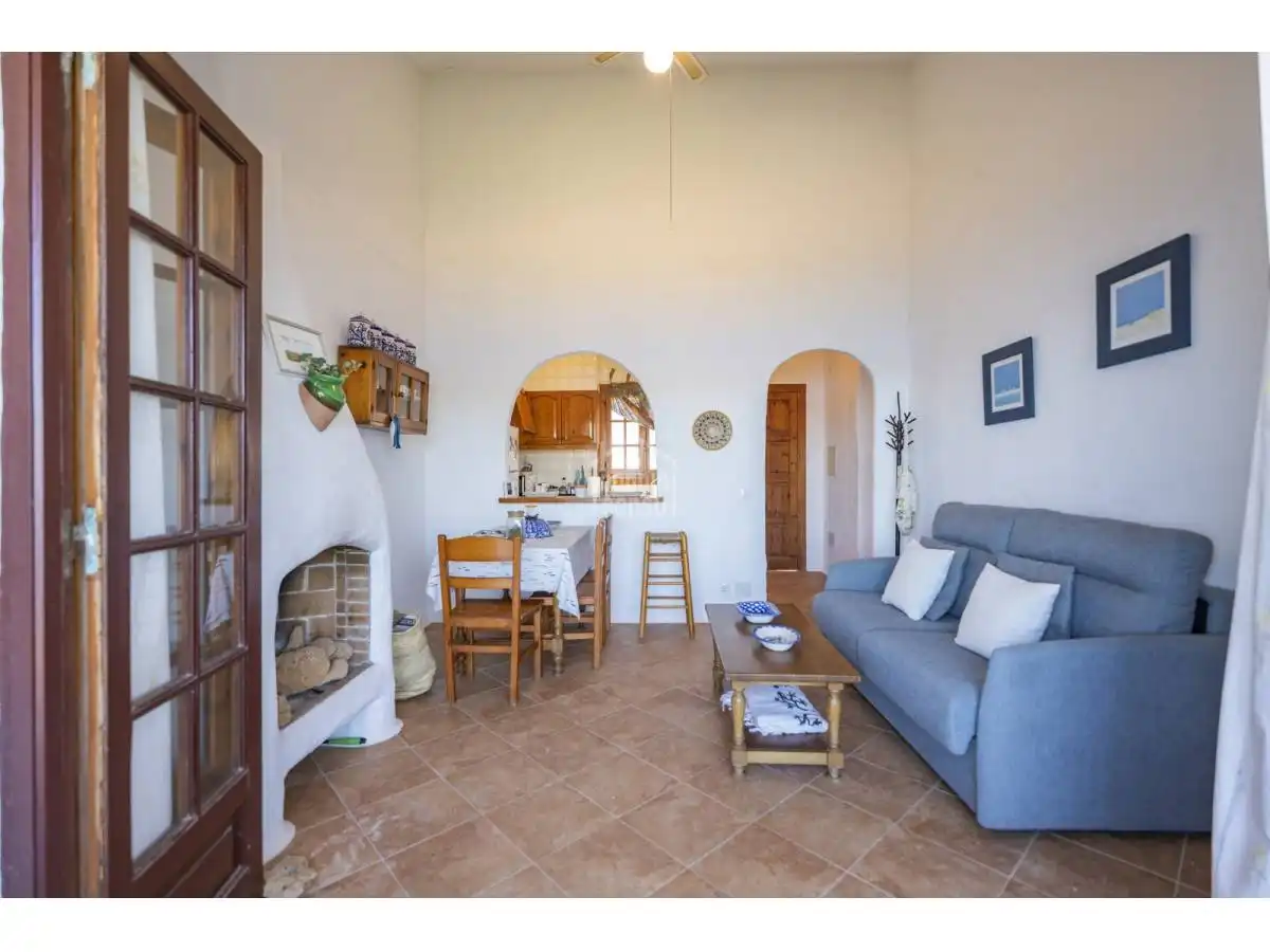 Sala d'estar de Apartament en venda en Es Mercadal amb Jardí privat, Terrassa i Moblat