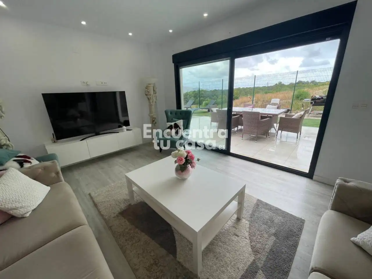 Sala d'estar de Casa o xalet en venda en L'Alfàs del Pi amb Aire condicionat, Calefacció i Jardí privat