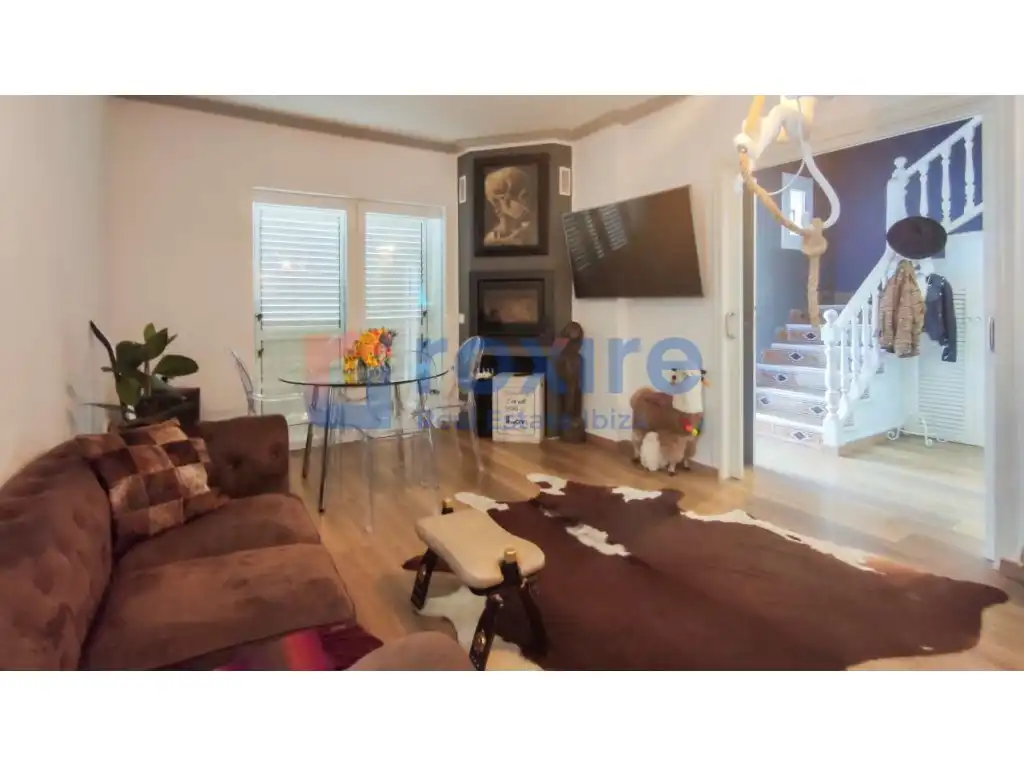 Sala d'estar de Planta baixa en venda en Sant Josep de sa Talaia amb Aire condicionat, Jardí privat i Terrassa