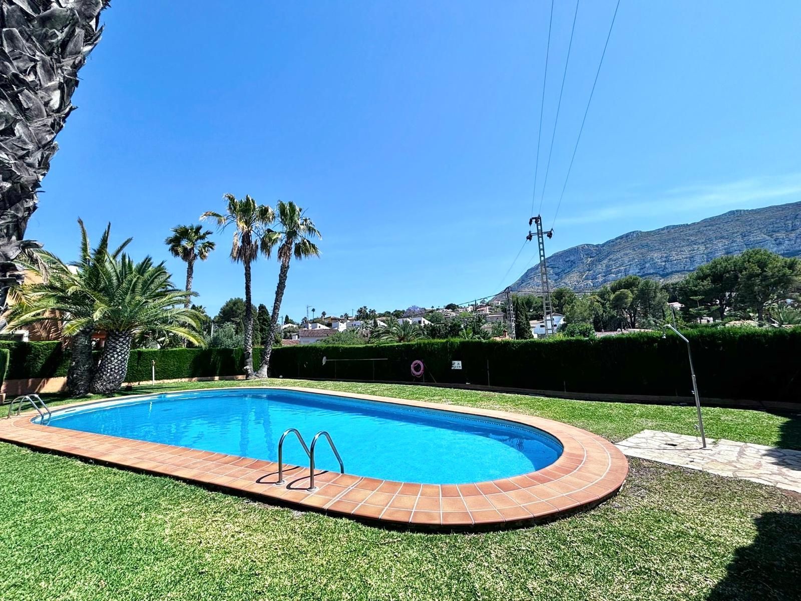 Swimming pool of Single-family semi-detached for sale in Dénia  with Air Conditioner, Terrace and Community pool
