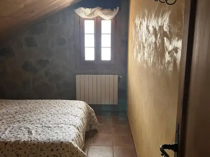 Dormitori de Casa o xalet en venda en Huéscar amb Jardí privat, Piscina i Moblat