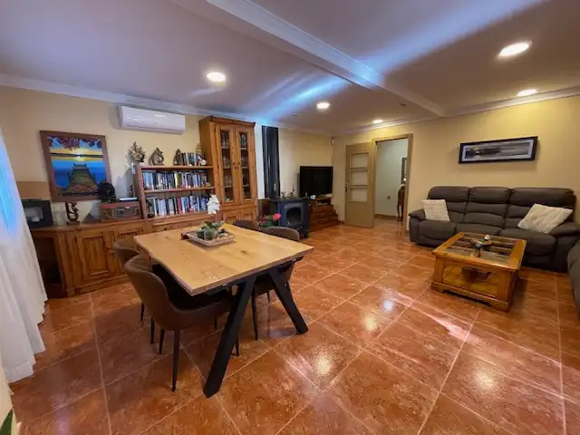 Sala d'estar de Casa o xalet en venda en Alicante / Alacant amb Aire condicionat, Calefacció i Jardí privat