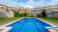 Swimming pool of Single-family semi-detached for sale in Calafell  with Air Conditioner and Terrace