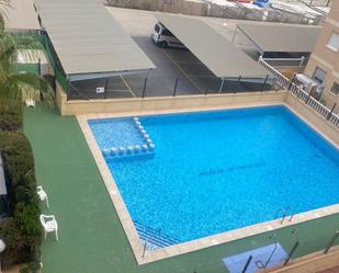 Swimming pool of Apartment for sale in Torrevieja  with Air Conditioner, Terrace and Community pool